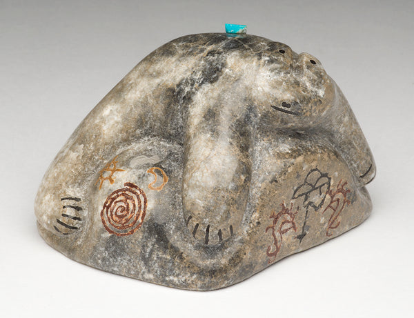 Sunning Bear On Rock