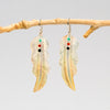 Carved Gold Lip Shell Feather Earrings