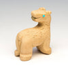 Browsing Giraffe With Turquoise Leaf