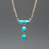 Sleeping Beauty Turquoise Open-Back Pendant Necklace
